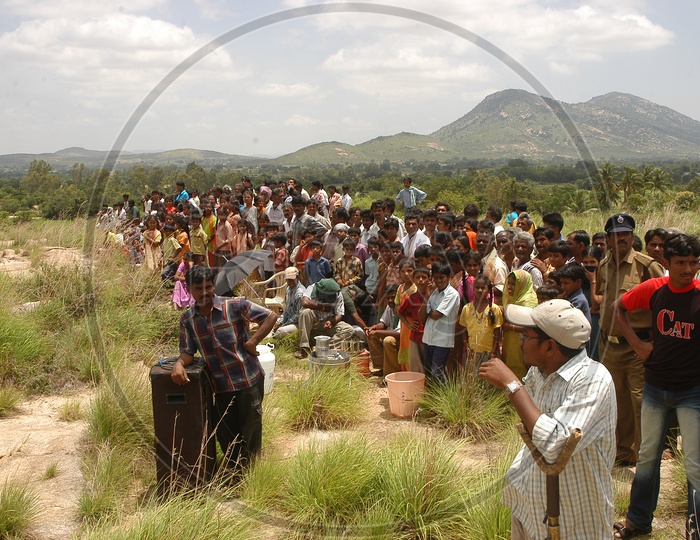 People watching the Telugu Movie Shooting in a Rural Village