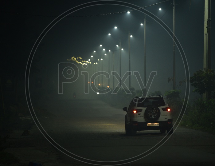 Commuting Vehicles On Hyderabad City Roads At Night