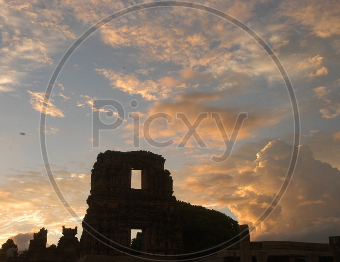 Old Ruins Of An Ancient Hindu Temple with Sunset in Background