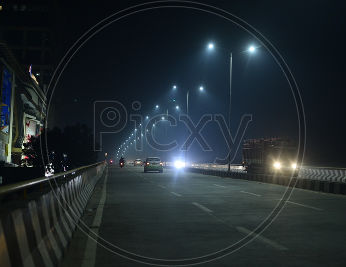 Bike Commuters On A Smog Filled roads During Diwali Night