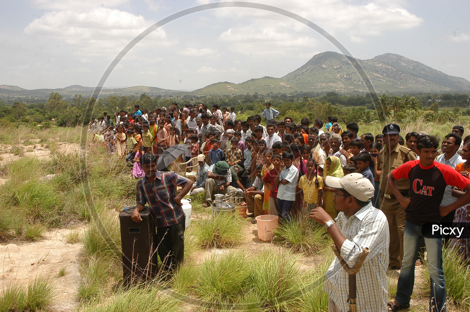 People watching the Telugu Movie Shooting in a Rural Village