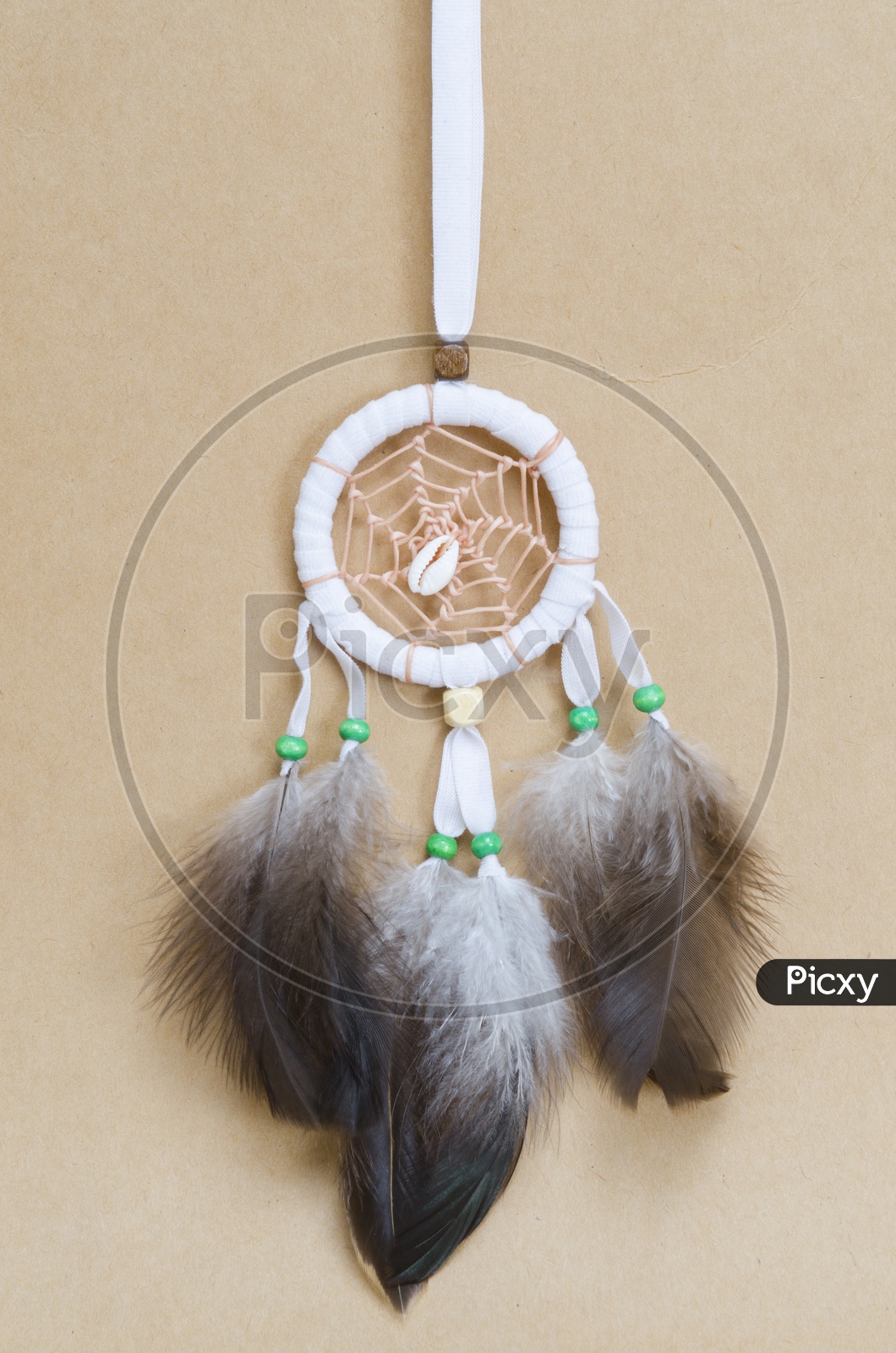 A Dream-catcher on the vintage brown background