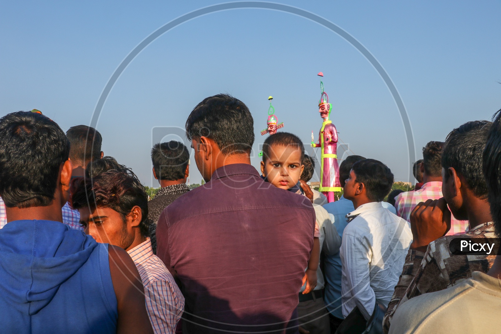 Crowd watching the effigies of Ravan during Dussehra celebrations, 2019.