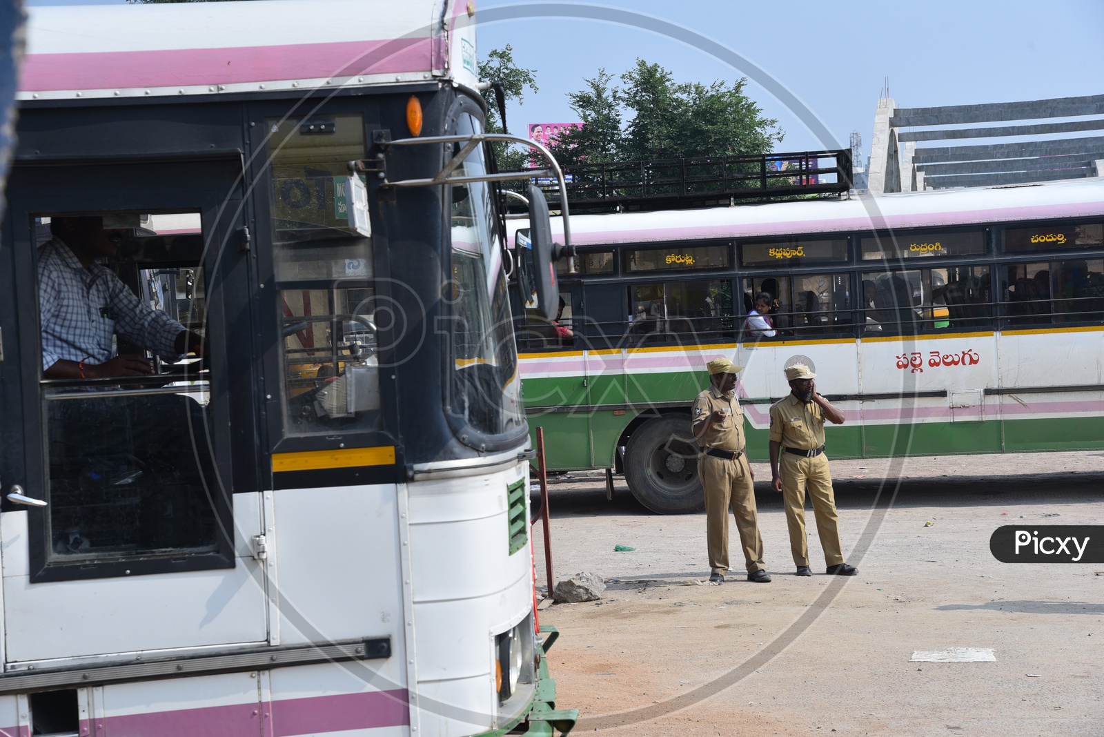 Police protection for the buses being run with Private temporary drivers and conductors at many bus stands and roads across telangana because of the ongoing indefinite strike of TSRTC workers, October 7, 2019