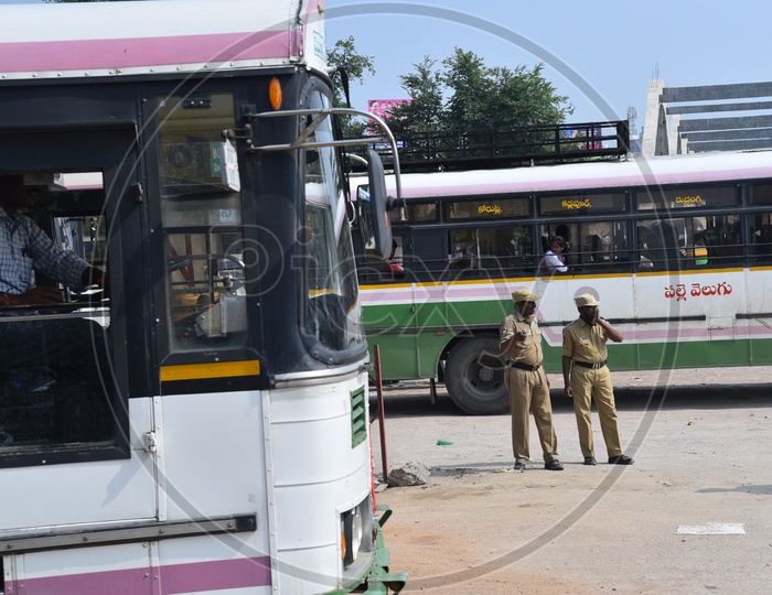 Police protection for the buses being run with Private temporary drivers and conductors at many bus stands and roads across telangana because of the ongoing indefinite strike of TSRTC workers, October 7, 2019