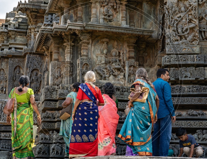 Tourists Or Visitors At Ancient Hoysala Architecture Of Sri Chennakeshava Temple In Belur , Karnataka