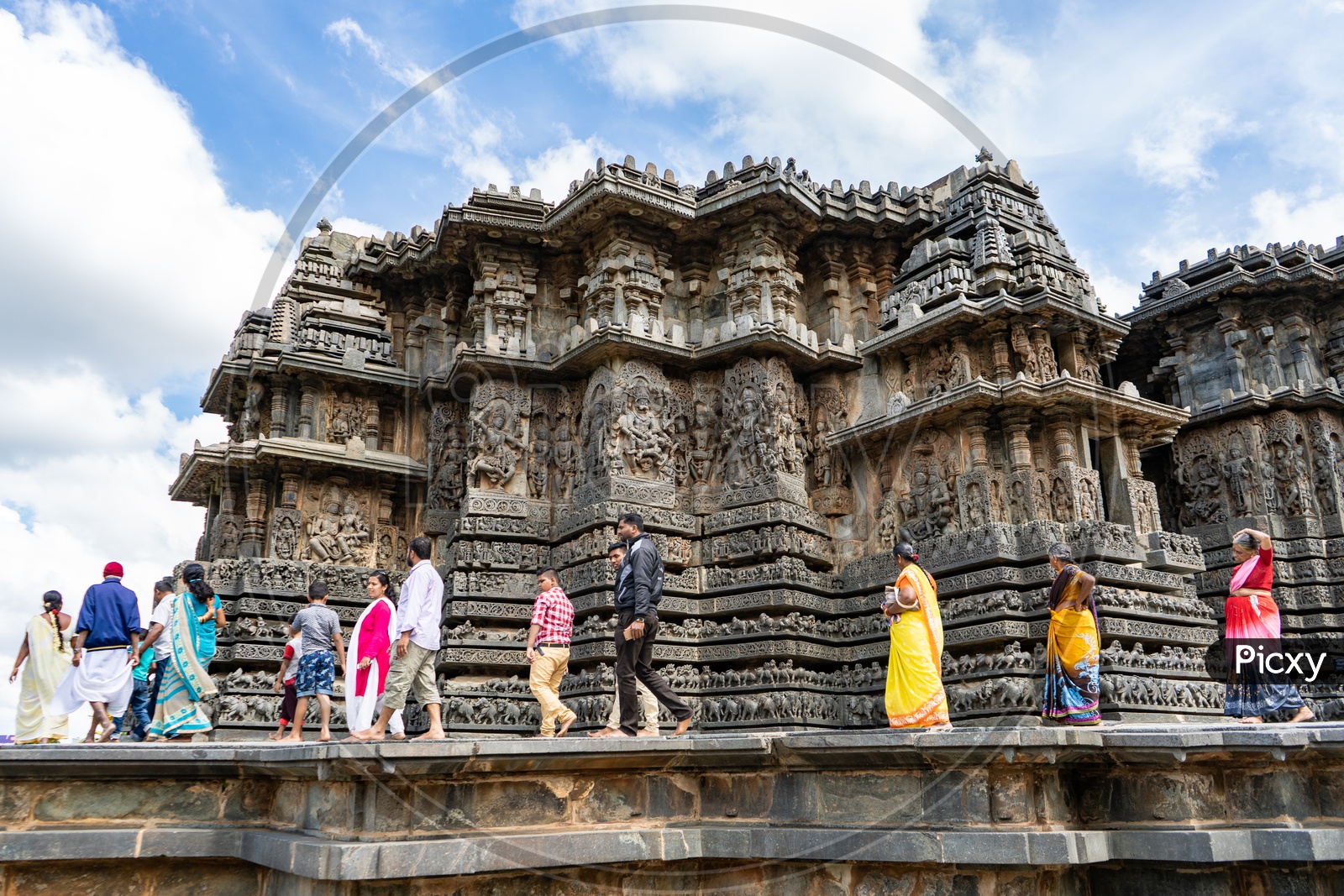 Tourists Or Visitors At Ancient Hoysala Architecture Of Sri Chennakeshava Temple In Belur , Karnataka