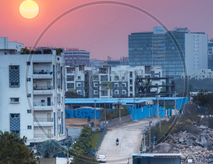 Sunset Over Hyderabad City Scape With Highrise Apartments And Corporate Offices