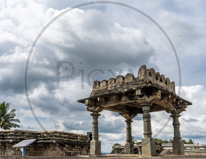 Architecture Of Ancient Hindu Temple With Stone Crafted  Wall Sculptures And Pillars At Sri Chennakeshava Temple in Belur , Karnataka