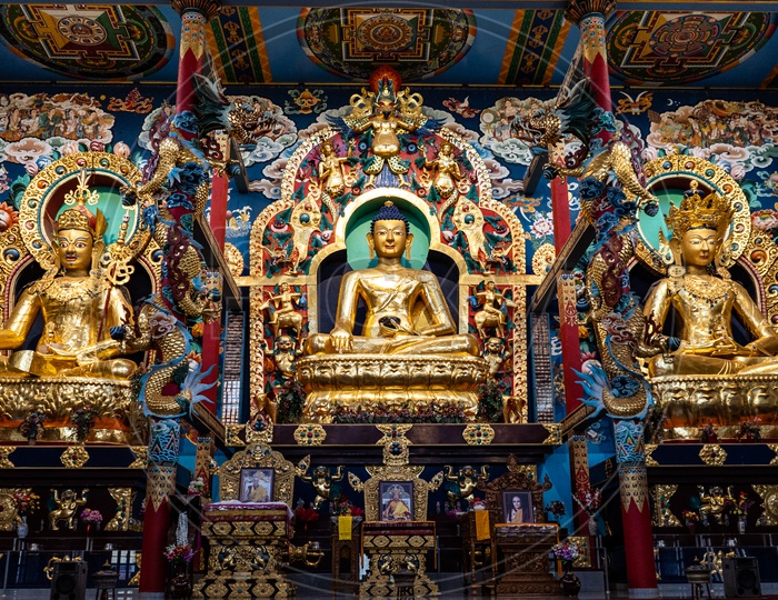 Golden Buddha Statues In Buddhist Golden Temple At Namdroling Monastery in Bylakuppe, Karnataka