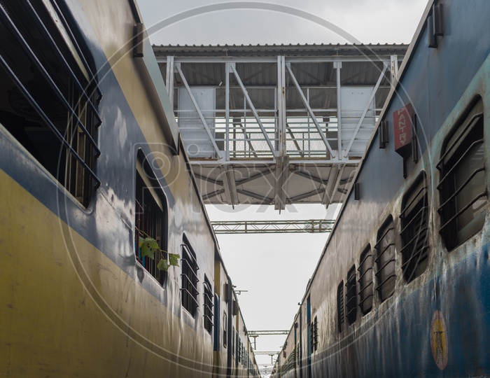 Two trains going side by side at railway station