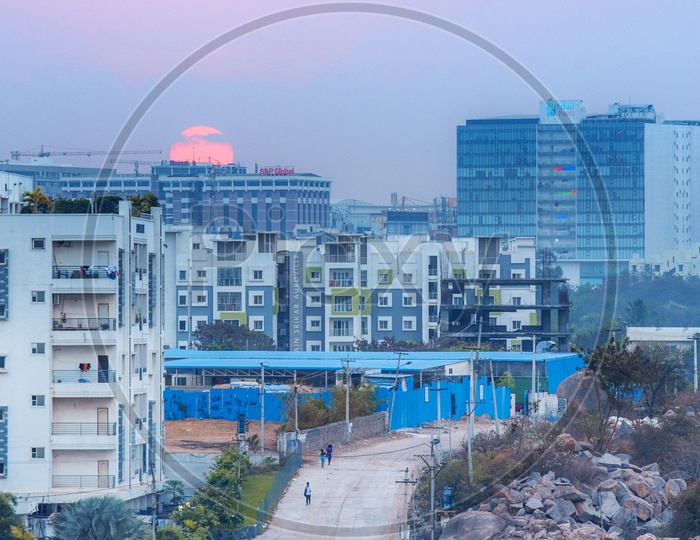 Sunset Over Hyderabad City Scape With Highrise Apartments And Corporate Offices