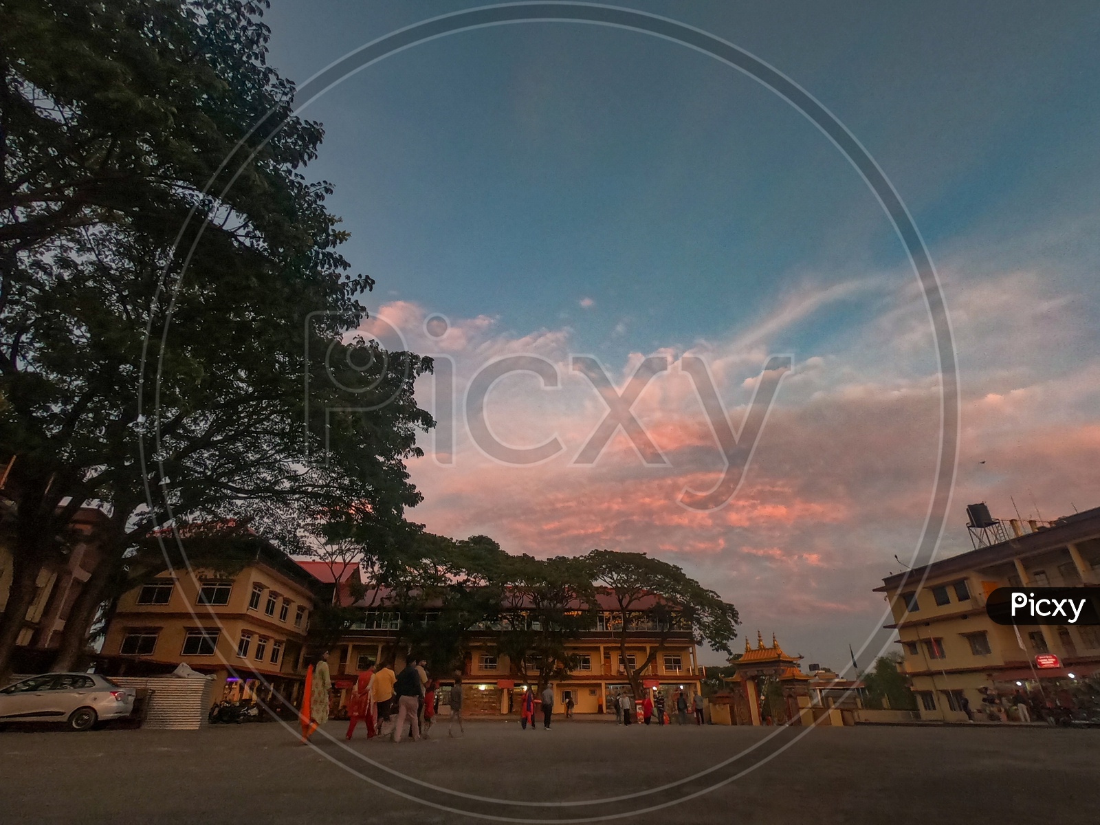 Residential Apartment Of Buddhist Monks At Namdroling Monastery With Sunset Sky