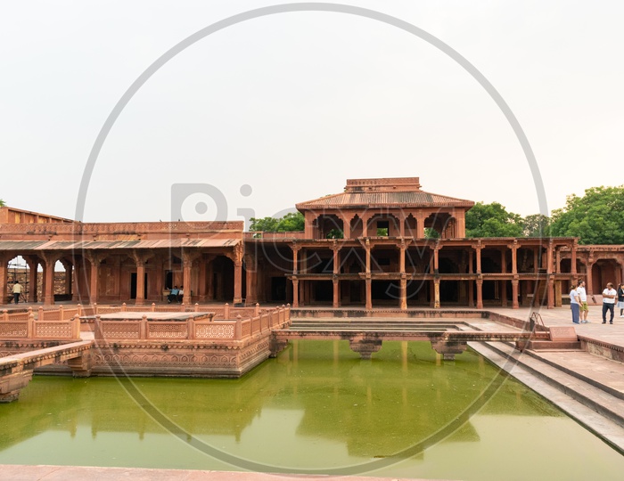 Architecture Of Agra Fort With Pond Or Lake With  Mandapas Build With Pillars