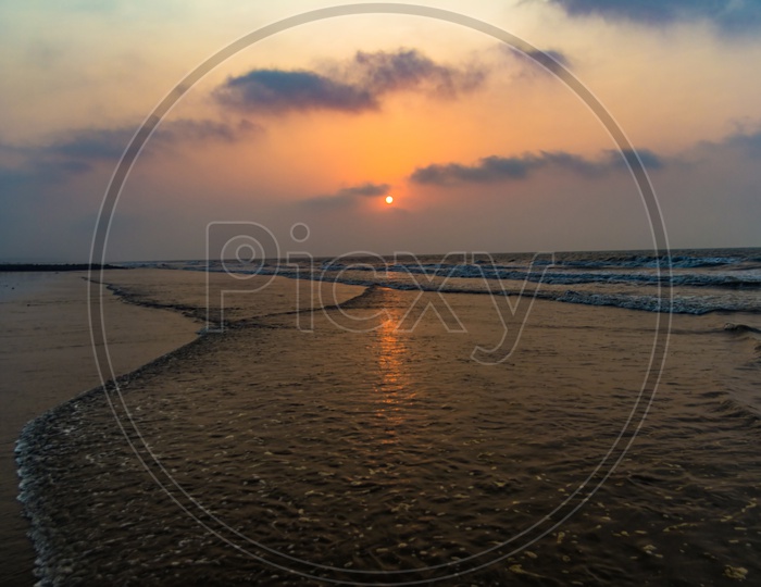 Vivid Sunrise On A Serene Calm Tranquil Deserted Beach At Digha Puri Mandarmaniwith Space For Text