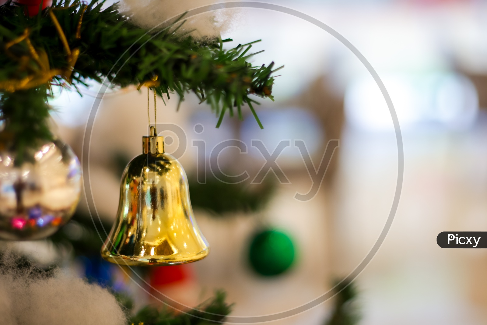 Christmas Decoration With Gift Bells Balls Boxes Boots Stars With Christmas Tree And Cotton With Blurred Background