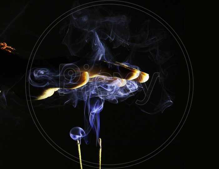 Hand Over Smoke From An Incense Stick For Divine Religious Blessings