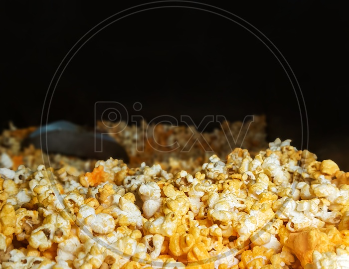 Close Up View Of Heaped Yellow Isolated Cheese Pop Corn
