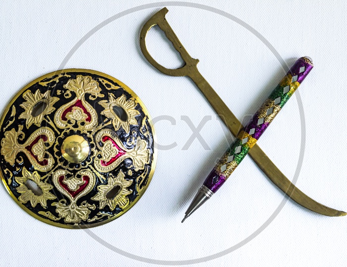 Pen Is Mightier Than Sword Concept By Decorated Round Sword Shield And Pen In White Background.Antique Artefact