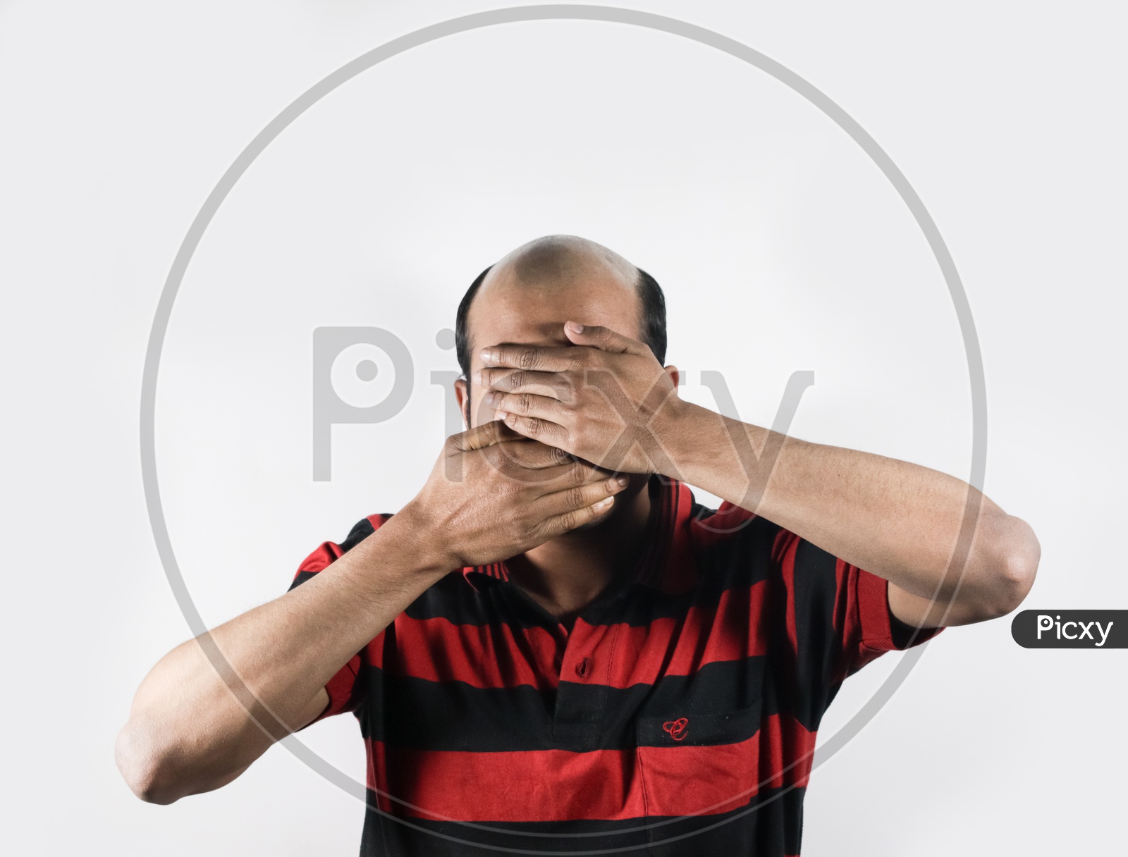 Bald Man Covering His Face In Shame In White Background With Space For Text