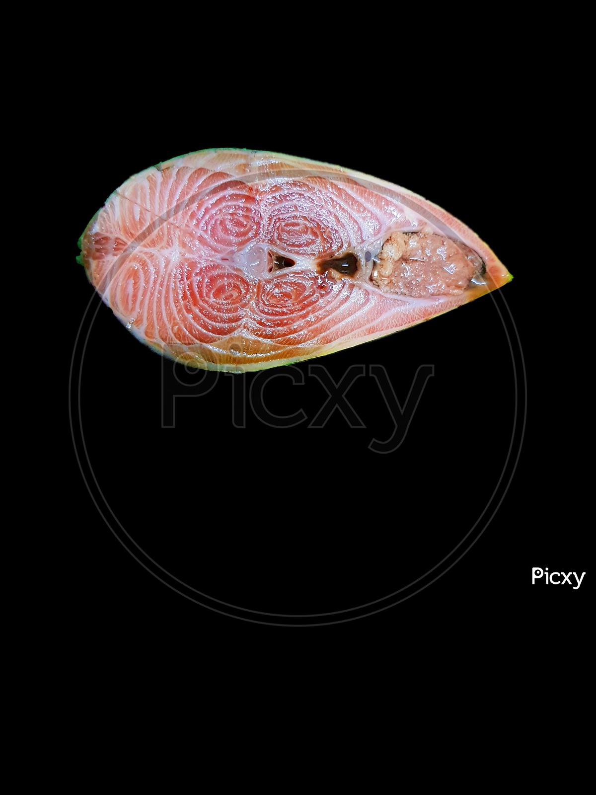 image-of-a-piece-of-fresh-cross-sectionally-cut-hilsa-fish-in-black