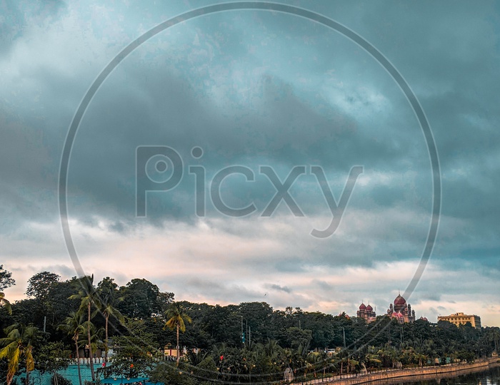 Musi River Channel At Chaderghat In hyderabad With Dark Clouds In Background