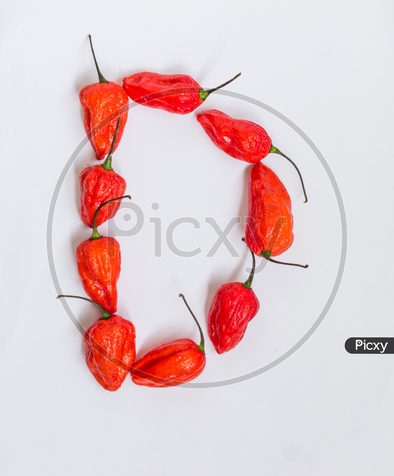 Letter D Alphabet Made With Ghost Pepper Bhoot Jolokia Over White Background