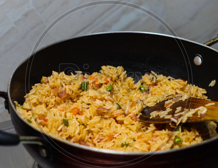 Fried Rice Pulao Cooking In A Frying Pan