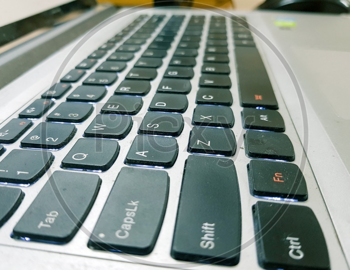 Closeup Side View Of Laptop Keys