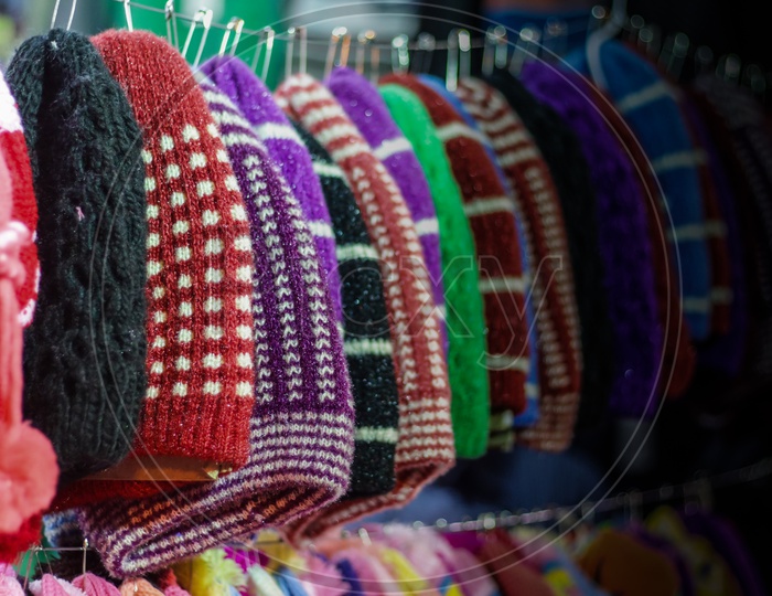 Colourful Woolen Caps For Sale At A Garment Shop. Winter Shopping Season