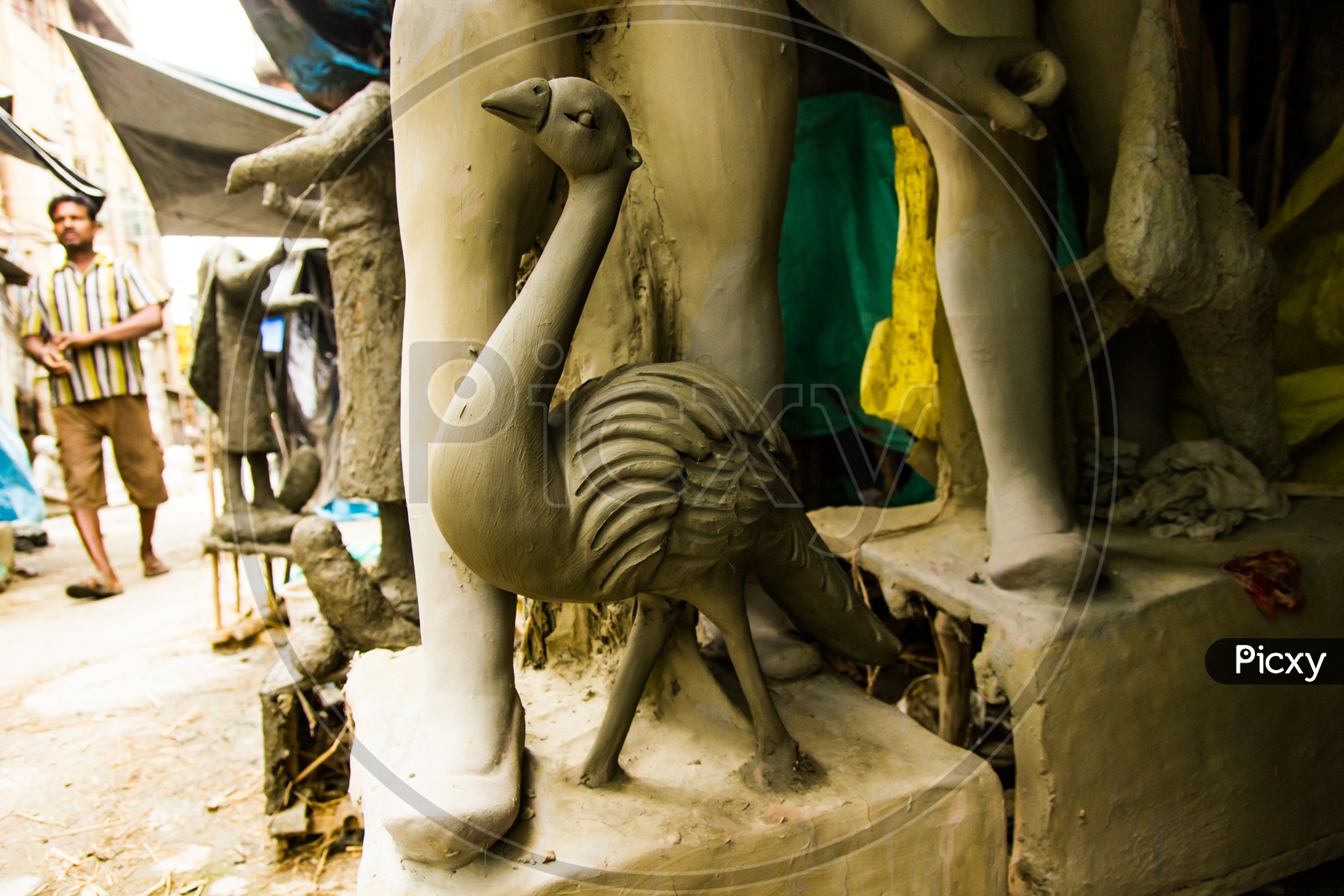 Kumartuli,West Bengal, India, July 2018. A Clay Statue Of A Peacock Under Construction At A Shop During Day Time For Sale