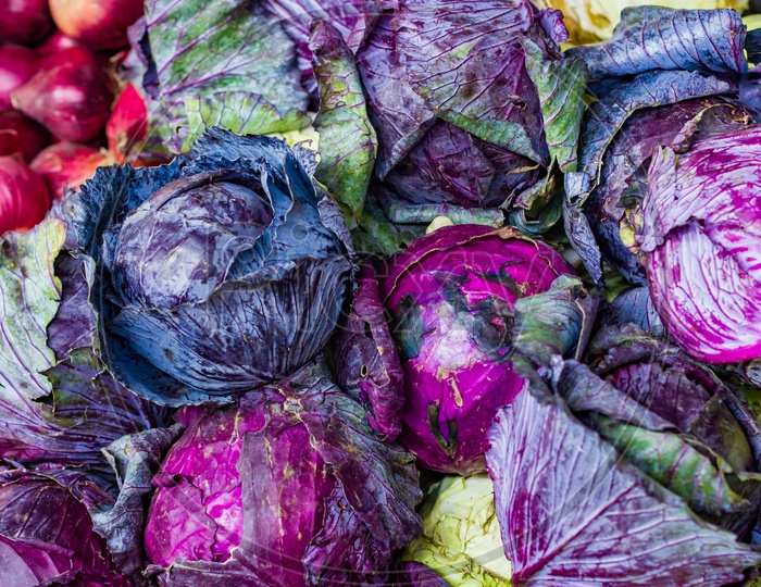 Heap Of Violet Purple Cabbage In Retail Vegetable Super Market For Sale