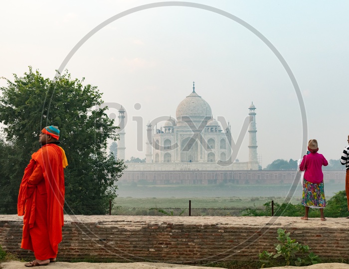 A Buddhist Saint  At  Taj Mahal On a Foggy Morning