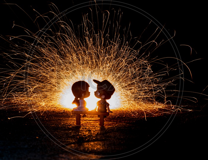 Miniature Of An Romantic Couple With Light Sparkles In Background