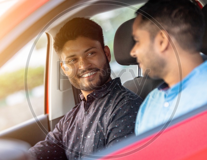 Indian Happy Man With Smile Face   in  a Car
