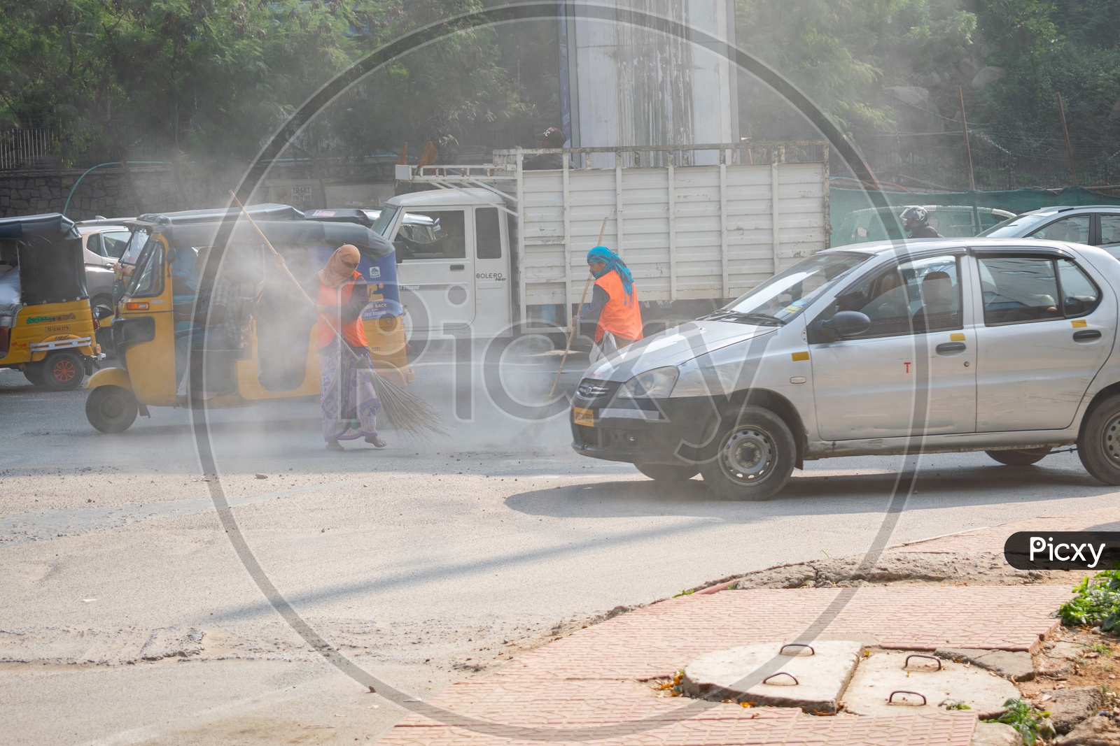 GHMC Workers Sweeping Roads in Hyderabad City