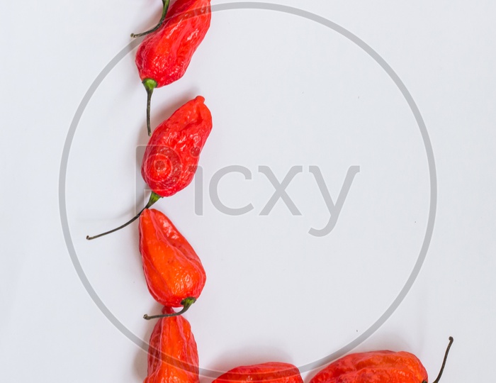 Letter L Alphabet Made With Ghost Pepper Bhoot Jolokia Over White Background