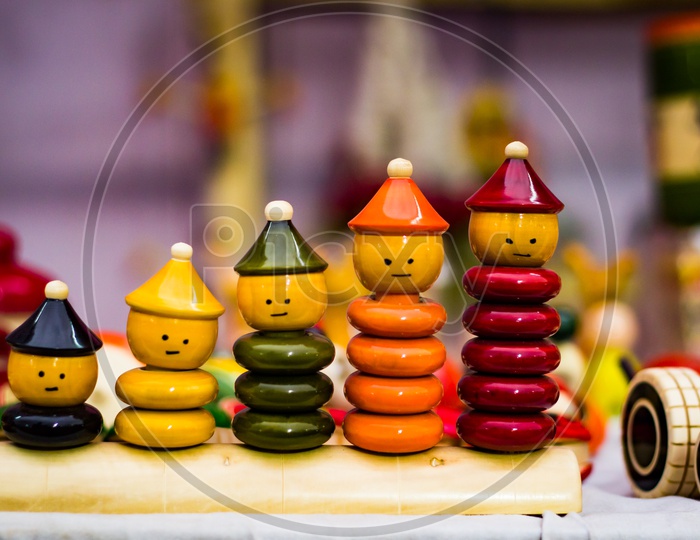 Colourful Ring Toy Stacking Doll Figures With Increasing Sizes
