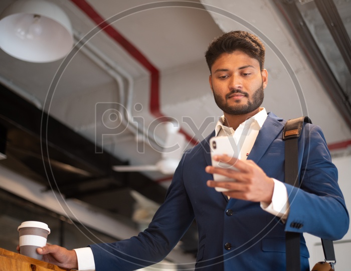 Indian Businessman Using Smartphone