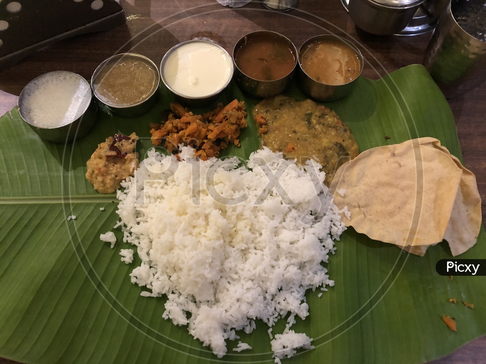Banana leaf Lunch In Traditional Andhra Style Meals Served  At a Restaurant