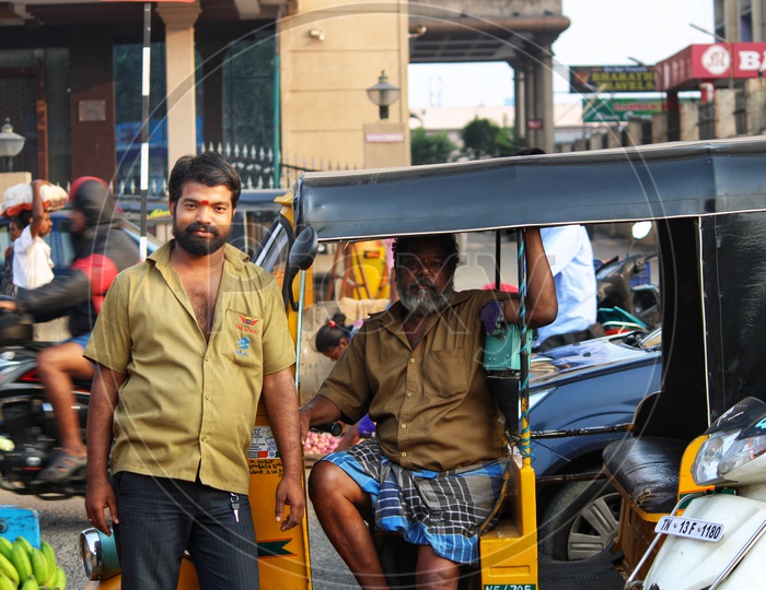 Auto Driver In Khakhi Dress At his Auto