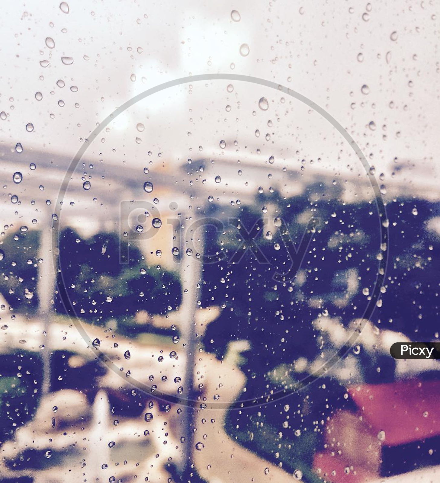Rainy window glass in office
