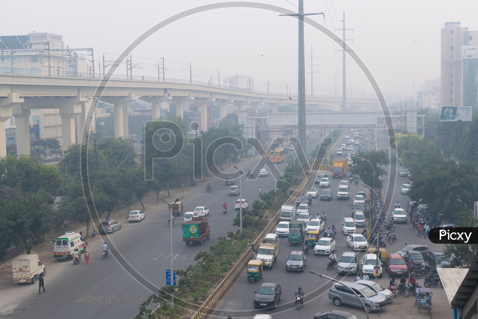 Pollution at Severe Level In Delhi NCR, Vehicles on road and Delhi metro line over bridge
