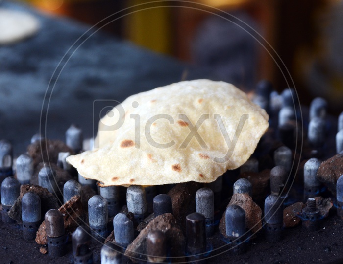 Indian food, Hot roti or Phulka roti, chapati on grill