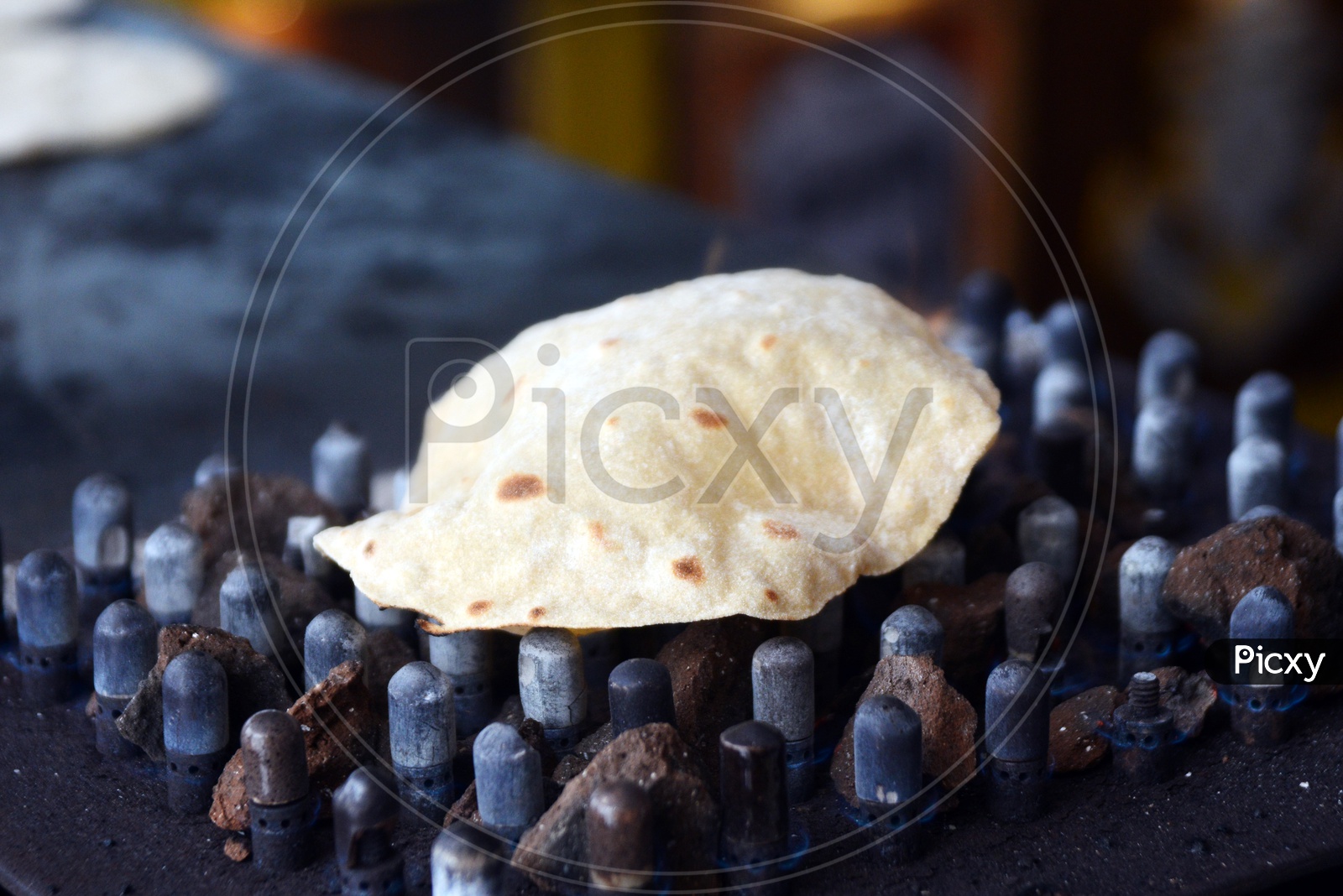 Indian food, Hot roti or Phulka roti, chapati on grill