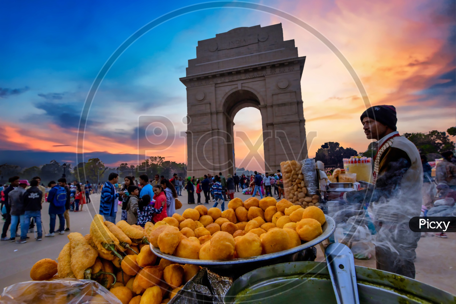 Street vendors selling street food at india gate during sunset dusk hours