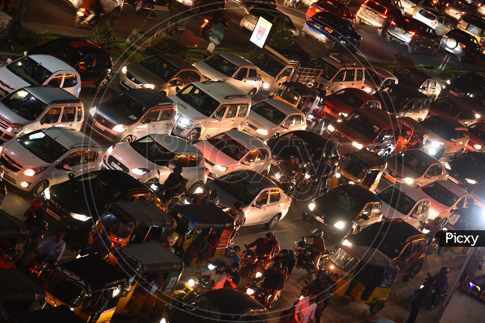 Traffic Jam In A Metropolitan  City At a Traffic Signal With Cars, Bikes And Autos Stranded