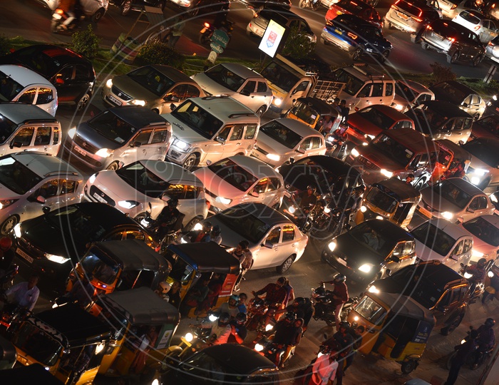 Traffic Jam In A Metropolitan  City At a Traffic Signal With Cars, Bikes And Autos Stranded