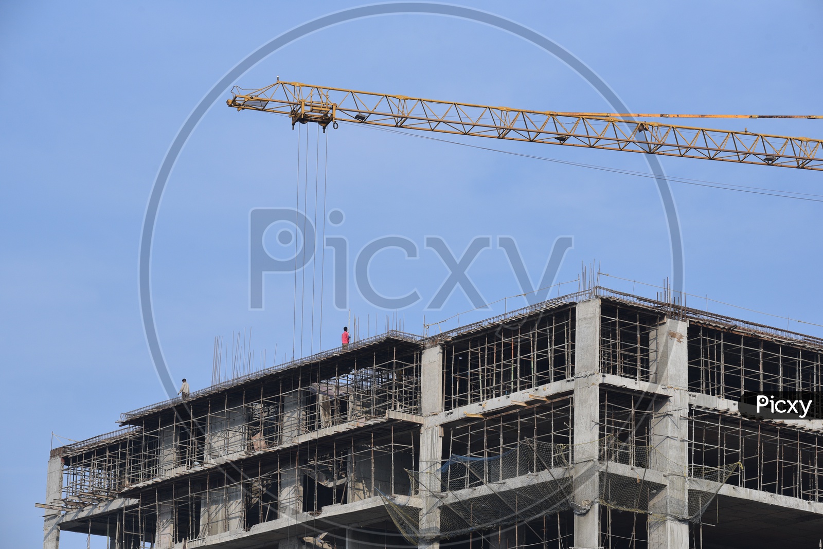 Under Construction  Buildings Or Apartments With Crane And Construction Workers