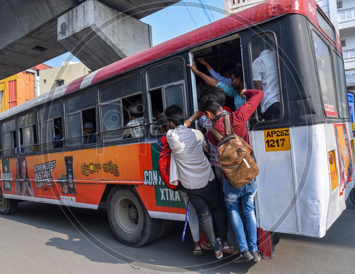 Students Foot Board Travelling In a City Bus, hyderabad